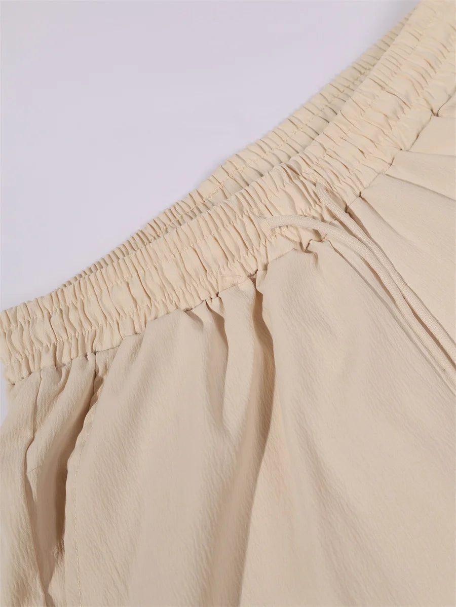 Novo verão 2 peças casual todos os dias lapela shorts conjunto havaiano cor sólida sem mangas camisa masculina praia shorts