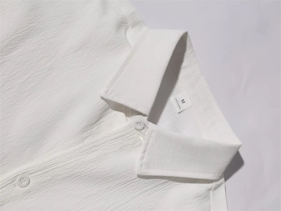 Novo verão 2 peças casual todos os dias lapela shorts conjunto havaiano cor sólida sem mangas camisa masculina praia shorts